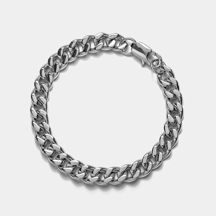 NORTHLINE Lil Cuban silver-tone bracelet arranged in a circle on white
