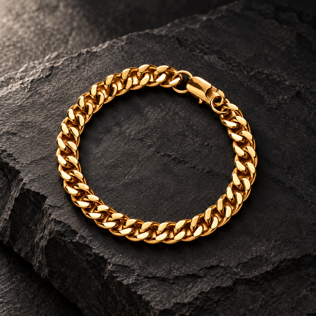 The Lil Cuban — Gold-tone editorial view on charcoal stone