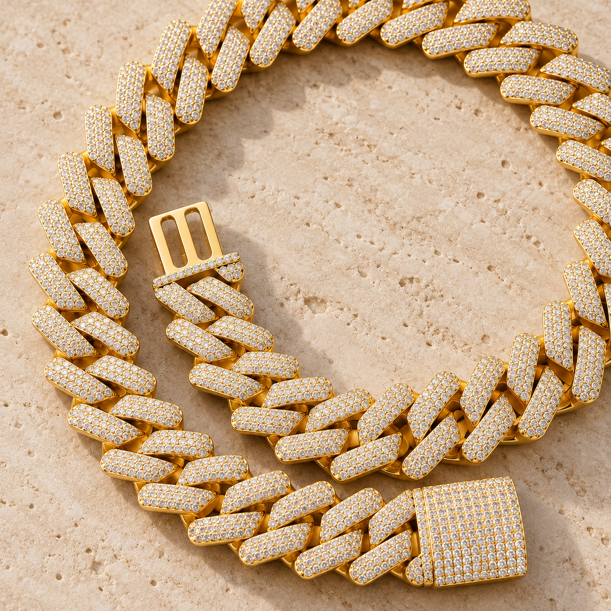 The Big Cuban — Gold-tone detail view on cream stone