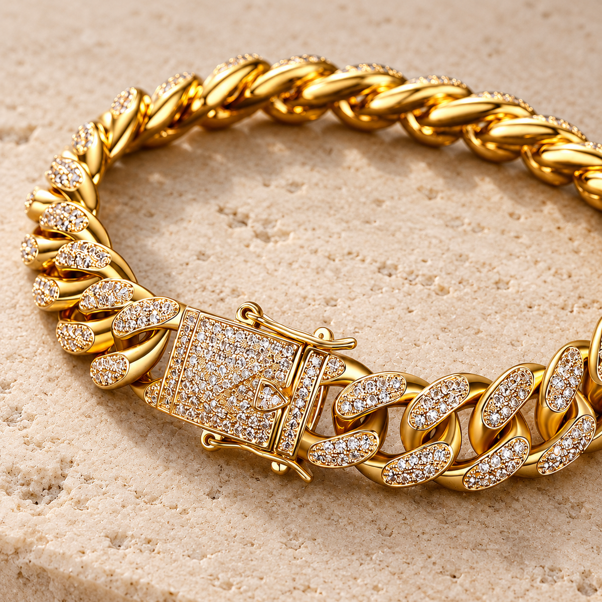 The Cuban Cuff — Gold-tone detail view on cream stone