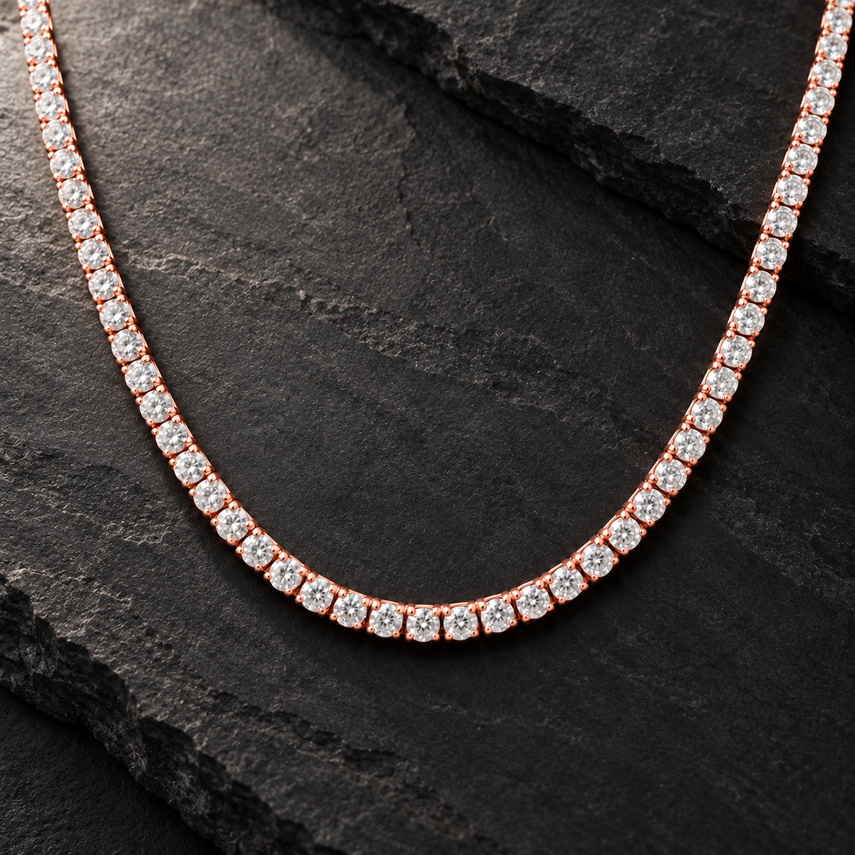 The Tennis Club Necklace — Rose Gold-tone editorial view on charcoal stone