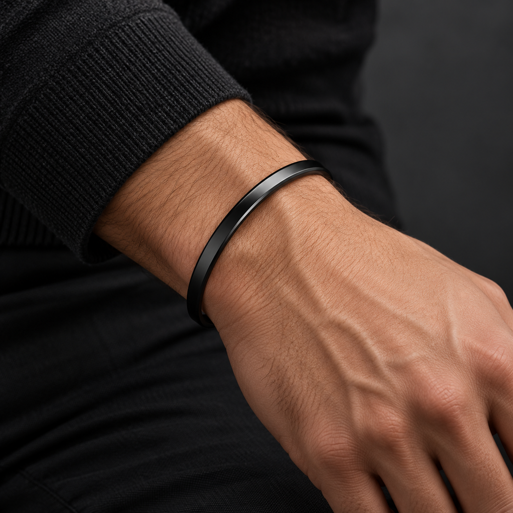 The Arc Cuff — Black worn on a model — AI-generated styling image