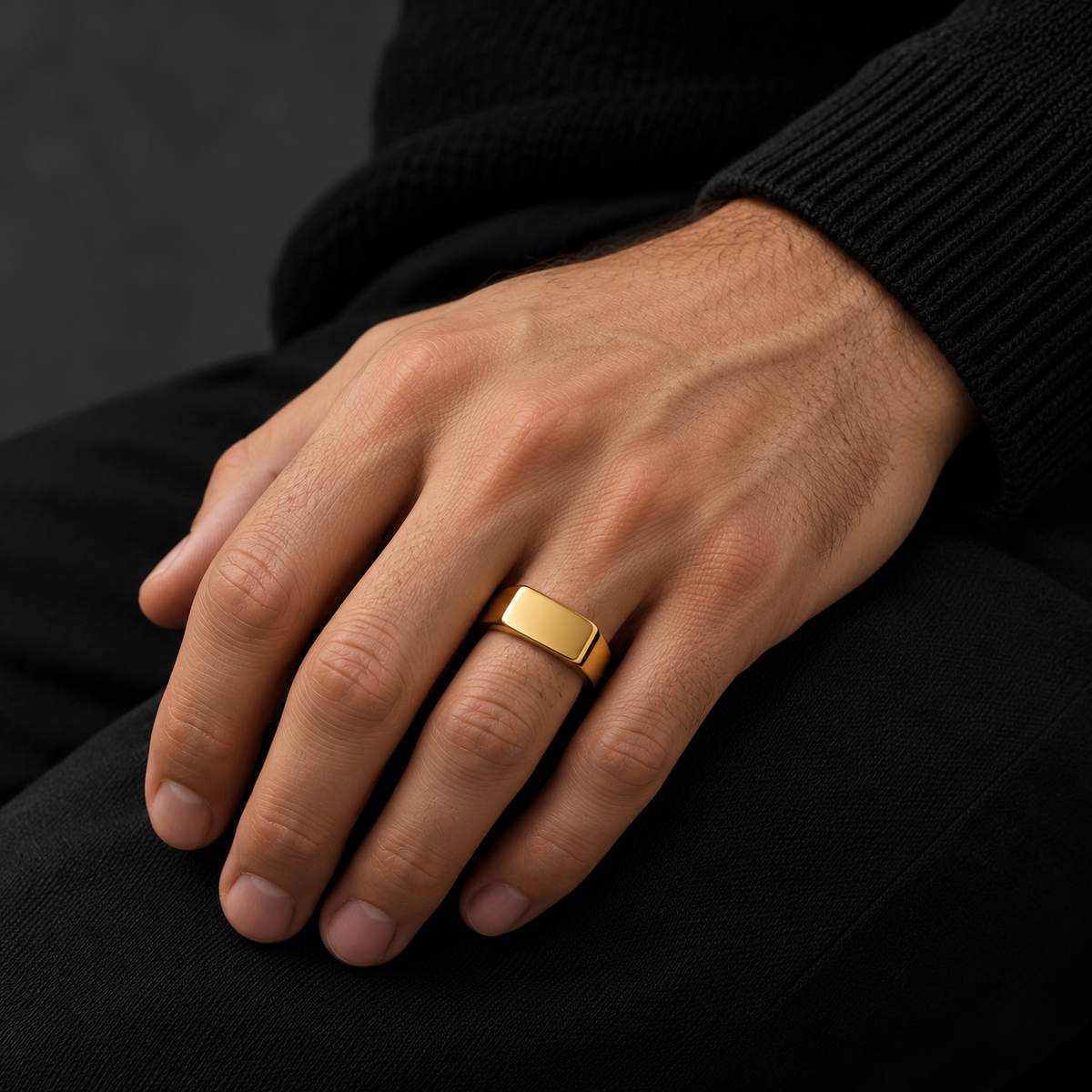The Frame Signet — Gold-tone worn on a model — AI-generated styling image