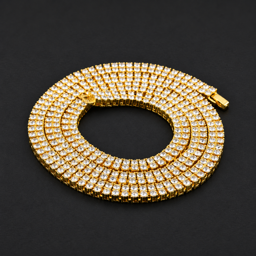 NORTHLINE Double Halo gold-tone stone-set chain coiled on a dark surface